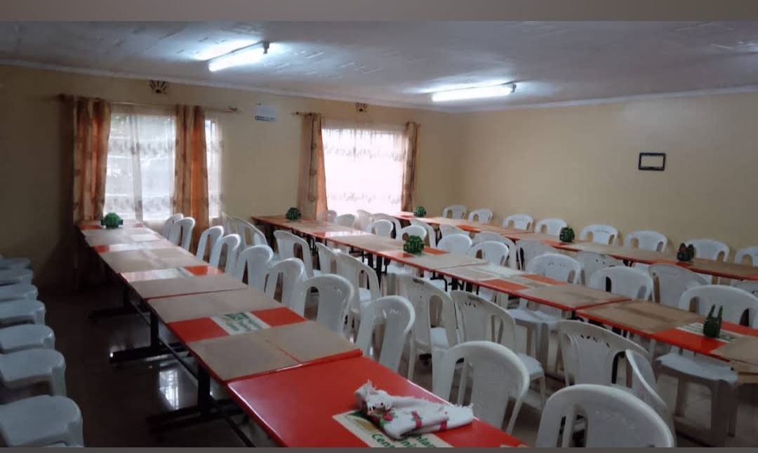 The dining hall set with red and orange runners